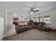 Comfortable living area with carpet and tile flooring adjacent to the kitchen at 6141 Annville Ct, North Las Vegas, NV 89081