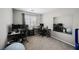 Bedroom with multiple computer desks, perfect for home office or gaming setup at 6228 Haiku Stairs St, Las Vegas, NV 89148