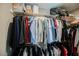 Organized walk-in closet featuring upper and lower rods for ample storage at 6228 Haiku Stairs St, Las Vegas, NV 89148