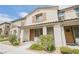 Inviting townhouse showcases a covered porch, low-maintenance landscaping, and a quaint seating area at 6228 Haiku Stairs St, Las Vegas, NV 89148