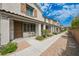 Attractive townhome featuring a cozy front porch, perfect for enjoying a morning coffee at 6228 Haiku Stairs St, Las Vegas, NV 89148