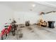 Spacious two-car garage with shelving and ample storage space for vehicles, bikes and other belongings at 6228 Haiku Stairs St, Las Vegas, NV 89148
