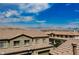 A rooftop view with mountains in the distance at 6228 Haiku Stairs St, Las Vegas, NV 89148