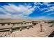 A rooftop view of adjacent homes with mountain views in the distance at 6228 Haiku Stairs St, Las Vegas, NV 89148