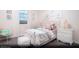 Charming bedroom featuring a cozy bed, a bright window, and views of the surrounding landscape at 627 Bellus Pl # Lot 156, Henderson, NV 89015