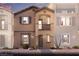 Spanish Colonial-style home boasts a private balcony, desert landscaping, and a covered front entry at 627 Bellus Pl # Lot 156, Henderson, NV 89015