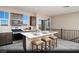 Modern kitchen with stainless steel appliances, white countertops, and island with bar stool seating at 627 Bellus Pl # Lot 156, Henderson, NV 89015