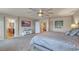 Relaxing main bedroom with television, access to ensuite, and a spacious layout at 6453 Mount Eden Ave, Las Vegas, NV 89139