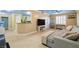 Inviting living room with open floor plan, bar seating, and access to a modern kitchen at 6655 Flaminian Ln # 104, North Las Vegas, NV 89084