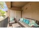 Outdoor patio with comfortable seating and decorative plants at 6655 Flaminian Ln # 104, North Las Vegas, NV 89084