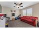 Upstairs bonus room with ceiling fan, carpeted floors, and plenty of space at 6857 Stone Tower Ct, Las Vegas, NV 89149
