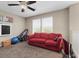 Bonus room with ceiling fan, carpeted floors, and abundant natural light at 6857 Stone Tower Ct, Las Vegas, NV 89149