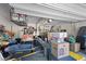 Cluttered garage providing ample storage space for tools, equipment, and more at 6857 Stone Tower Ct, Las Vegas, NV 89149