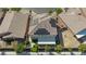 Aerial view of the home featuring solar panels, backyard patio, and landscaping at 7112 Rancho De Taos Ct, Las Vegas, NV 89130