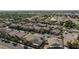 Expansive aerial view of a vibrant residential neighborhood with well-maintained homes and mature landscaping at 7112 Rancho De Taos Ct, Las Vegas, NV 89130