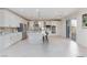 Bright, open kitchen features an island, modern appliances, and white cabinetry at 7112 Rancho De Taos Ct, Las Vegas, NV 89130