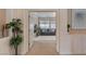 Bright living room featuring neutral color scheme and doorway to an adjacent bedroom at 7112 Rancho De Taos Ct, Las Vegas, NV 89130