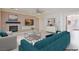 Inviting living room with fireplace, plush seating, and stylish decor at 7112 Rancho De Taos Ct, Las Vegas, NV 89130