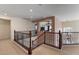 Upstairs loft area with railings, great for flexible living at 7112 Rancho De Taos Ct, Las Vegas, NV 89130