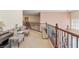 Second floor loft area with seating and attractive railing at 7112 Rancho De Taos Ct, Las Vegas, NV 89130