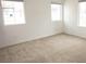 Bright bedroom with neutral carpet and lots of natural light from three windows at 7342 N Decatur Blvd # 5, Las Vegas, NV 89131