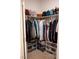 Walk in closet features ample storage space with multiple shelving units and clothing racks at 7342 N Decatur Blvd # 5, Las Vegas, NV 89131