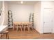 Bright dining room with a modern table, chairs, and neutral decor at 7342 N Decatur Blvd # 5, Las Vegas, NV 89131
