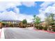 Community entrance gate with mature trees and landscaping at 7342 N Decatur Blvd # 5, Las Vegas, NV 89131