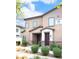 Inviting two-story townhome featuring desert landscaping and a cozy covered entryway at 7342 N Decatur Blvd # 5, Las Vegas, NV 89131
