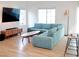 Bright living room with ample natural light, modern furniture, and hardwood floors at 7342 N Decatur Blvd # 5, Las Vegas, NV 89131