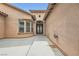 Stylish entrance featuring patterned glass doors and a beautifully landscaped courtyard at 7404 Eggshell Dr, North Las Vegas, NV 89084