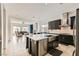 Spacious kitchen flows into the living area, creating an inviting and functional living space at 7404 Eggshell Dr, North Las Vegas, NV 89084