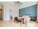 Bright main bedroom featuring a large window and a ceiling fan at 7404 Eggshell Dr, North Las Vegas, NV 89084
