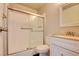 Clean bathroom featuring a glass-enclosed shower, grab bars, and a vanity with cabinet storage at 745 N Royal Crest Cir # 127, Las Vegas, NV 89169