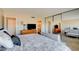 Spacious bedroom featuring a queen-size bed and mirrored closet at 745 N Royal Crest Cir # 127, Las Vegas, NV 89169