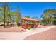 Outdoor gazebo with red roof and pillars, set amongst trees at 745 N Royal Crest Cir # 127, Las Vegas, NV 89169