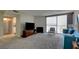 Spacious living room with lots of natural light and a view of the balcony at 745 N Royal Crest Cir # 127, Las Vegas, NV 89169