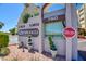 Casablanca Condominiums sign with manicured plants and entrance at 745 N Royal Crest Cir # 127, Las Vegas, NV 89169