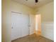 Neutral bedroom features closet, carpeted floors, and access to another room at 7611 Redcloud Peak St St, Las Vegas, NV 89166