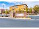 Westcott community entrance sign amidst professionally landscaped greenery, cacti, and stone masonry at 7611 Redcloud Peak St St, Las Vegas, NV 89166