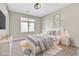 Inviting bedroom with a comfortable bed, soft lighting, and tasteful decor for a cozy atmosphere at 7624 Mallard Bay Ave, Las Vegas, NV 89179