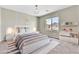Nicely decorated bedroom with neutral tones, soft lighting, and cozy feel for relaxation at 7624 Mallard Bay Ave, Las Vegas, NV 89179