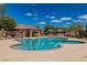 Inviting community pool with ample seating and shade, perfect for relaxation and recreation at 7624 Mallard Bay Ave, Las Vegas, NV 89179