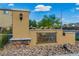 Stone and stucco entry sign for Monterly Ranch in a residential community under a bright blue sky at 7624 Mallard Bay Ave, Las Vegas, NV 89179