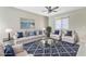 Spacious living room with comfortable seating, stylish decor, and a cozy atmosphere at 7624 Mallard Bay Ave, Las Vegas, NV 89179