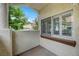 Cozy balcony with privacy walls, showcasing outdoor living space at 8012 Desire Ave, Las Vegas, NV 89128