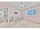 Bedroom boasts carpet, a window with shutters, and a built in dresser at 8012 Desire Ave, Las Vegas, NV 89128