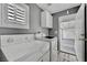 Functional laundry room with modern appliances and ample natural light at 8012 Desire Ave, Las Vegas, NV 89128