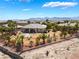 Backyard featuring mature palm trees and rock landscaping, and a desert-style landscape at 8536 Grand Palms Cir, Las Vegas, NV 89131