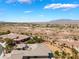 Panoramic aerial view overlooking the desert landscape and mountains in the distance at 8536 Grand Palms Cir, Las Vegas, NV 89131